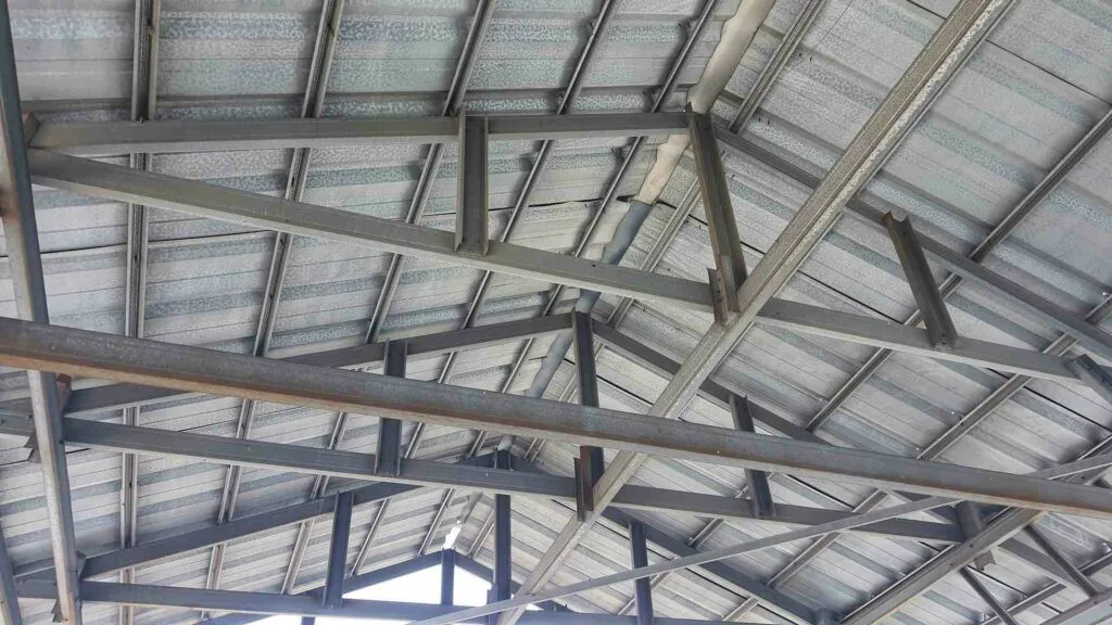 Steel roof framing ready for spray foam insulation